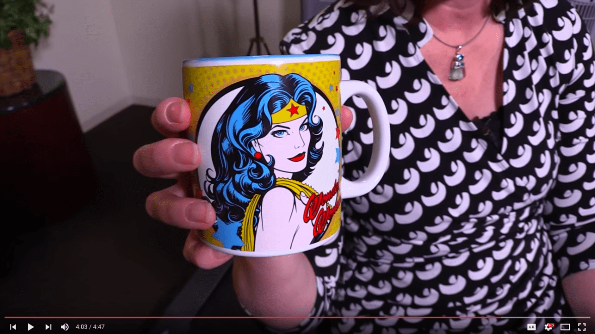 So this is my Wonder Woman mug, and it was given to me by my husband and my children. It says: As lovely as Aphrodite, as wise as Athena- which I think is a nice complement. It reminds me of who I?m working for really and why I do what I do.