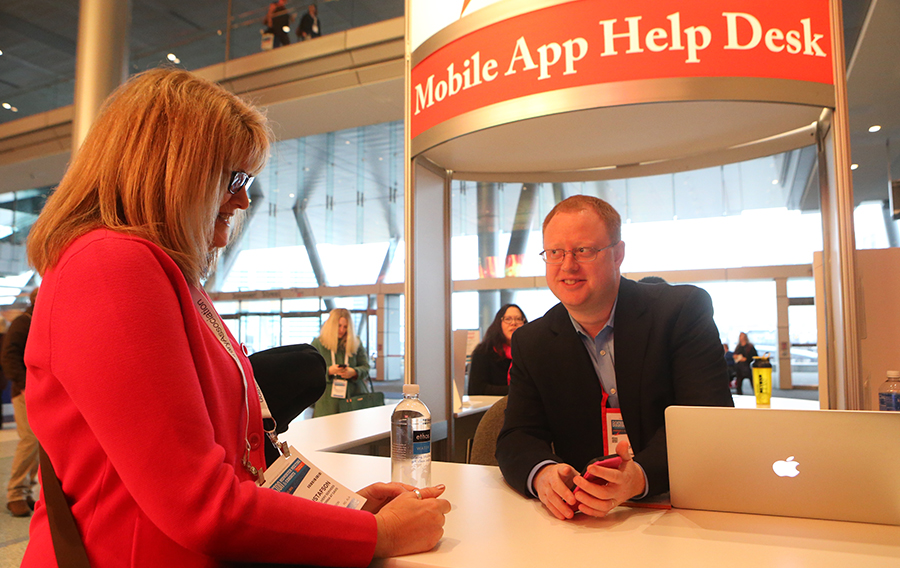 CadmiumCD co-founder, Peter Wyatt, provides app assistance to an attendee at ALA Midwinter 2016.